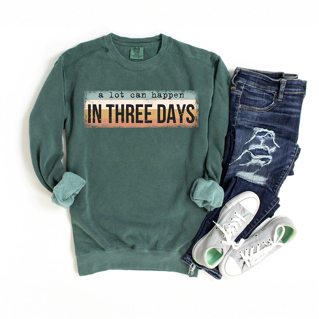 A Lot Can Happen In Three Days Colorful | Garment Dyed Sweatshirt